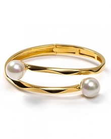 Gold makes an impact with Majorica's ripple bracelet finished with delicate pearl tips.