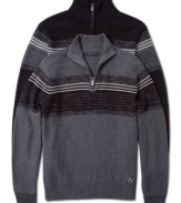 Just when the chill starts to set in, this 1/4 top zip long sleeve pullover sweater by Calvin Klein Jeans is the ideal sweater to wear over layers.