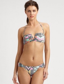 A vibrant print and classic bikini silhouette combine to create an alluring design, including a removable halter strap for style versatility. Removable halter strapBandeau topBack clasp closureSexy, ruched sides on stretch bottomFully lined80% nylon/20% spandexHand washMade in USA