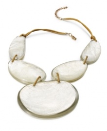 Style inspired by the sea. White resin stones resemble pretty seashells on Style&co.'s bold statement necklace. Setting and clasp crafted in gold-plated mixed metal. Approximate length: 20 inches + 2-inch extender. Approximate drop: 7 inches.