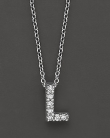 From the Tiny Treasures collection, a diamond L necklace. With signature ruby accent. Designed by Roberto Coin.