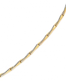 Golden and glamorous. A stylish X-patterned bracelet dazzles with diamond accents. Crafted from 14k gold. Approximate length: 7-1/2 inches.