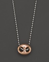 18K pink and white golds make a striking statement on this ball chain necklace.