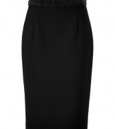 Luxe pencil skirt in fine, black viscose and synthetic fiber blend - Classically chic, slim cut - Higher waist, hits just above the knee - Flattering fabric darts at hips - Gorgeous circular beaded embellishment at waistband - The details we love: sexy slit and silver zipper at back - Sophisticated and stylish, easily transitions from day to evening - Pair with a silk button down, cropped leather jacket or blazer and platform ankle booties