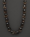 Smoky quartz beaded necklace with gold ball clasp.