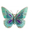 For the free-spirited fashionista. Lucky Brand's whimsical cocktail ring features a delicate butterfly decorated by turquoise, and purple enamel with plastic accents. Set in silver tone mixed metal. Size 7.