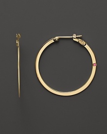 These flat 18K yellow gold hoops are a stunning take on a timeless classic. Set with a signature ruby accent.