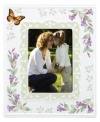 Spring is perpetually in season with whimsical Butterfly Meadow giftware. Colorful blooms and a playful butterfly mingle on this white porcelain picture frame, creating an extra-sweet scene for precious memories. Qualifies for Rebate