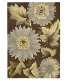 Oversized florals are carved with precision in soothing color upon hand-tufted polyester fibers in the Contour area rug. This combination of Impressionistic beauty and detailed craftsmanship creates a remarkable accent for the modern home.