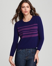 This Theory cropped cashmere sweater beckons with collegiate charm, featuring bold contrast stripes and a cozy love-worn feel.