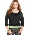 Armored with neon studs and flecked in metallic, this sweatshirt from Sugar Rush is anything but typical.