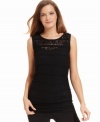 Calvin Klein's lace top adds a feminine touch to any skirt or pantsuit. A great day-to-night piece, too!