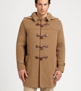 Impeccably crafted in Italy from luxurious wool, this cold weather essential exudes a modern sensibility with a point collar and attached hood, finished with leather-accented toggle closure for a heritage-inspired feel.Toggle closureAttached hoodWaist patch pocketsAbout 35 from shoulder to hemWoolDry cleanMade in Italy