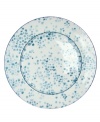 Offset the fanciful nature scene of Lulu Byzantine dinnerware with this confetti-patterned charger, crafted of durable white porcelain by Zrike.