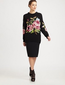 A chunky wool knit adorned with bold flowers.CrewneckLong sleevesPullover styleWoolDry cleanMade in Italy of imported fabric Model shown is 5'10 wearing US size 4. 