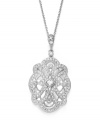 Creative inspiration. This elegant Eliot Danori pendant features swirling round, square, and pear-cut crystals in a silver tone mixed metal setting. Approximate length: 16 inches + 2-inch extender. Approximate drop: 2 inches.