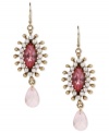 An attention-getter from Betsey Johnson. These teardrop earrings showcase stunning accents in pink-colored crystals, glass pearls and gold tone details. Crafted in antiqued gold tone mixed metal. Approximate drop: 2-1/2 inches.