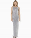 Lauren Ralph Lauren's bold sequin gown is crafted with a slit at the leg and an elegant draped back to create a glamorous evening look.