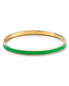 Go easy and green with this simply styled bangle from kate spade new york. Cast in glistening 12-karat gold, it's a stackable stroke of luck.