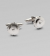 Uniquely crafted from polished sterling silver with logo detail.Sterling silverT-backingAbout ½ diam.Made in Italy