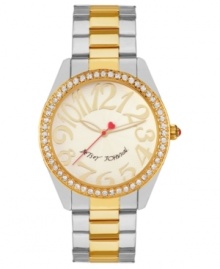 Shining example of pure fashion, by Betsey Johnson. This two-tone watch features crystal accents and eye-catching numerals at the dial.