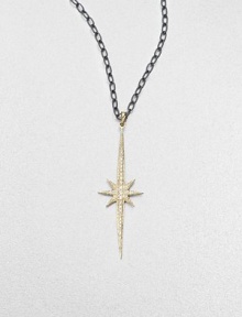 A dazzling diamond encrusted 14k gold starburst on a blackened sterling silver twisted link chain. Blackened sterling silverDiamonds, .3 tcw14k goldLength, about 16Pendant size, about 2Lobster clasp closureMade in USA