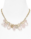 Crafted of rose quartz and glass pearls, this beaded necklace from Carolee is designed to add an elegant touch to your neckline. We love it under a simple white collar or over something little, black and dressy.