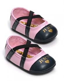 The perfect footwear for your little princess, these gold logo Juicy Couture shoes stay put with hip crisscross straps.