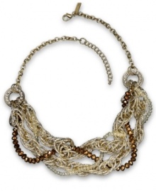 Style with a twist. INC International Concepts puts together a necklace crafted from 12k gold-plated mixed metal with a rhinestone link and a number of rondelles accents. Approximate length: 19-1/2 inches + 3-inch extender.