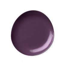 This fashion-forward porcelain dinnerware has signature DVF style - bold, unique, modern. The highly glossed surface, intentionally irregular curves and exposed seams create a chic tablescape and offer infinite styling possibilities. Mix and match with other colors in the Pebblestone collection to create your own signature look.