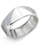 Sweet, slip-on style. Touch of Silver introduces affordable design with a structurally-unique bangle bracelet crafted in silver-plated steel. Approximate diameter: 2-1/2 inches. Approximate width: 4/5 inch to 1 inch.