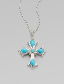 This cross of vibrant turquoise is framed in sterling silver and punctuated by luminous diamonds.Diamond, 0.15 tcw Sterling silver Pendant length, about 2½ ImportedPlease note: Chain sold separately 