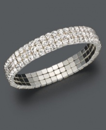 Sheer elegance to complete a look of evening glamour. Charter Club stretch bracelet features three sparkling rows of crystals set in silver tone mixed metal. Approximate diameter: 3-1/2 inches.