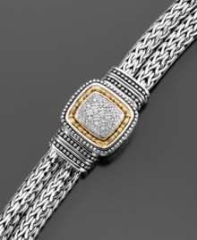 Exquisite design that lasts a lifetime. This classic diamond bracelet features round-cut diamonds (1/4 ct. t.w.) set in 14k gold & sterling silver. Approximate length: 7-1/2 inches.