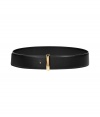 Cinch your look in luxe style with this lovely leather belt from Salvatore Ferragamo - Smooth leather with gold-tone buckle - Wear with a tie-neck blouse, a pencil skirt, and a long cardigan