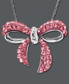 Pretty in pink. Kaleidoscope's adorable bow pendant shines in pink and clear crystal with Swarovski elements. Set in sterling silver. Approximate length: 18 inches. Approximate drop: 9/10 inch.