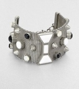 A wide cuff of silvery mesh is dotted with faceted glass stones and studs, plus a bow-shaped centerpiece in front.GlassSilvertone finishLength, about 7Bold spring ring claspImported