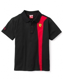 A bright racing stripe adds flash to this Ferrari logo polo from PUMA.