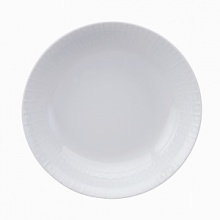 Modern in design with a raised circular pattern, made from French Limoges Porcelain. Dishwasher and microwave safe.