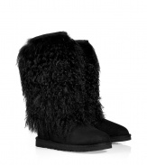 Attract attention in these luxe shaggy sheepskin boots from UGG Australia - Tall boots with shaggy shearling cuff, sturdy sole - Style with leather leggings, skinny jeans, or a mini-dress