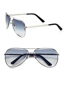 Classic metal aviator frames with lenses in a contrast shape for a subtly unique design. Available in silver with grey gradient lens. 100% UV protectionMade in Italy 