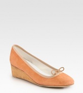 Buttery suede with a self-covered wedge, elastic trim and subtle string bow. Self-covered wedge, 2 (50mm)Suede upperLeather liningRubber solePadded insoleMade in FranceOUR FIT MODEL RECOMMENDS ordering one size up as this style runs small. 