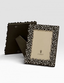 Swarovski crystals lend a twinkling effect to this oxidized platinum tone design. Holds 5 X 7 photoClassic beveled glassStretched leather backingGift boxedImported