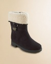 Velvety faux suede with fluffy faux shearling offers wintry warmth and comfort.Faux suede upperFaux shearling cuffMicrosuede liningPadded insoleRubber composite tread soleImported