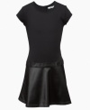 A drop waist with faux-leather skirt makes this little black dress from DKNY a bit more eyecatching.