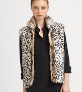 A leopard printed, dyed rabbit style in an easy to layer vest design. Stand collarSleevelessOpen frontAbout 24 from shoulder to hemFully linedDyed rabbitSpecialist dry cleanImported Fur origin: Spain 