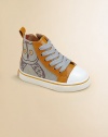 Classic high-tops get a fun update with an adorable owl print and rich leather trim.Lace-up frontSide zipperCotton canvas upper with leather trimRubber solePadded insoleImported