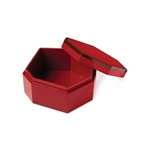 Vivid red lacquer adds a dash of drama to dressers, coffee tables and bookshelves.