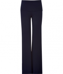 Sumptuously soft and effortlessly cool, Donna Karans pure, ink blue cashmere blend knit pants epitomize understated luxury - Crafted with a touch of flattering stretch material - Slim, medium-rise pull on style with fold-over waist - Bell cut flares gently at hem  - A must for chic off duty looks - Pair with cashmere pullovers,  button downs and tunic tops