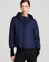 Brave the elements with style in this DKNY puffer coat, boasting a chic, cropped silhouette for modern sophistication.